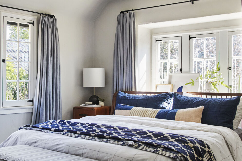 beds in front of windows